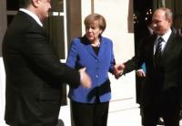 Путин и Порошенко пожали друг другу руки на встрече нормандской четверки в Париже